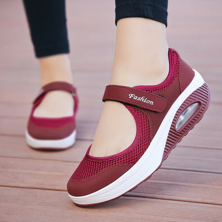 "Färgglada dam-modesneakers, andningsbara med ortopedisk fjädersula, perfekt för komfort och stil."