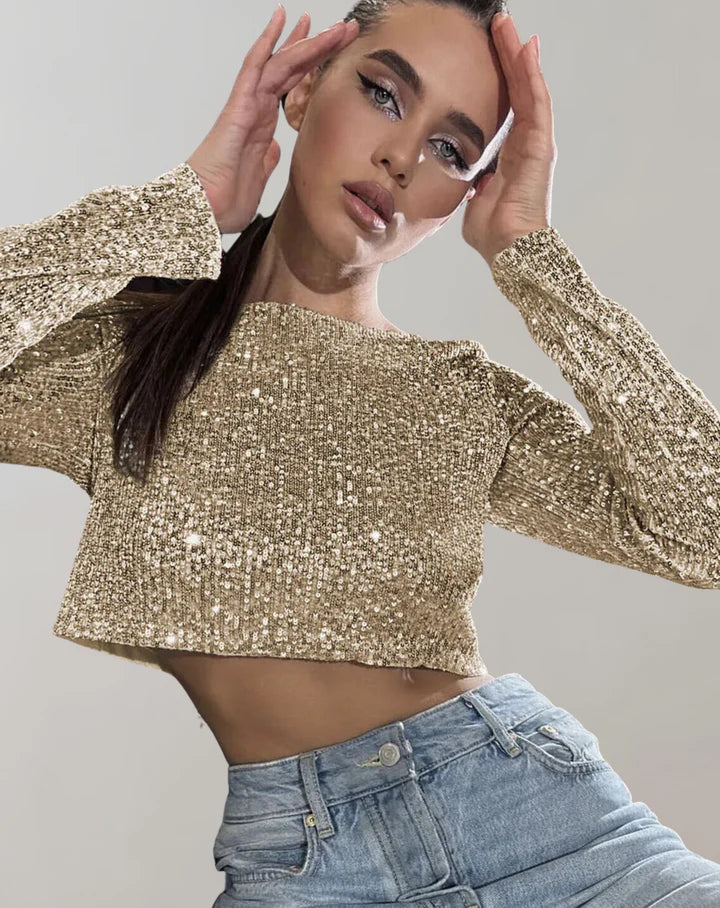"Glittrande dam crop top i polyester elastan, kortärmad design, perfekt för festlig elegans och självsäker stil."