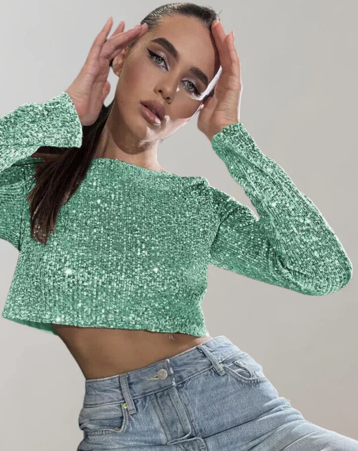 "Glittrande dam crop top i polyester elastan, kortärmad design, perfekt för festlig elegans och självsäker stil."