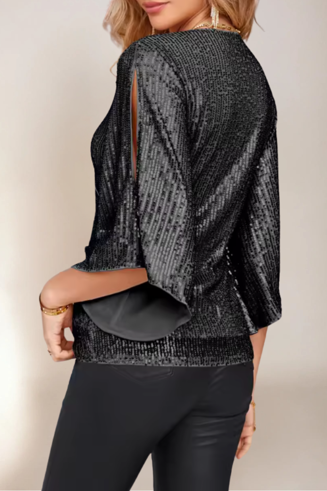 Glittrande dam wrap-blus med flödande ärmar och V-hals, perfekt för både vardag och fest.