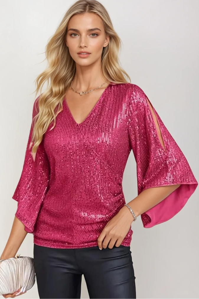 Glittrande dam wrap-blus med flödande ärmar och V-hals, perfekt för både vardag och fest.