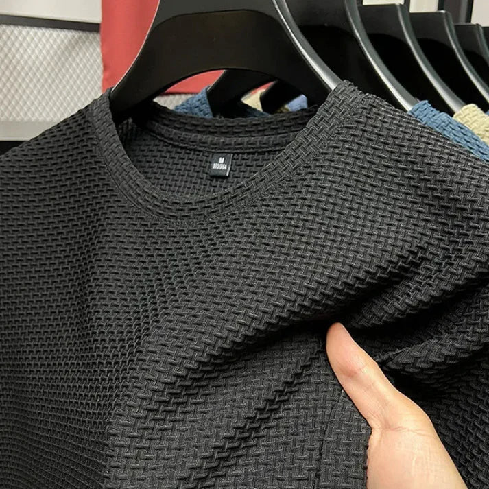 "Herr T-shirt kortärmad i andningsbart material för träning, grå färg, optimal ventilation och bekväm passform."