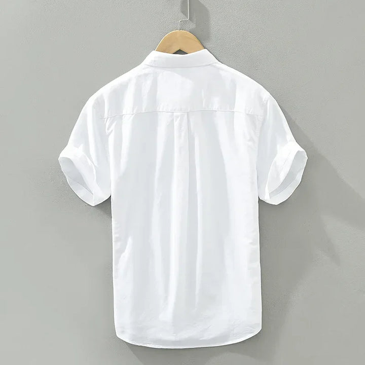 Herr andningsbar kortärmad bomullsskjorta med klassisk design, perfekt för varma sommardagar och avslappnade tillfällen.