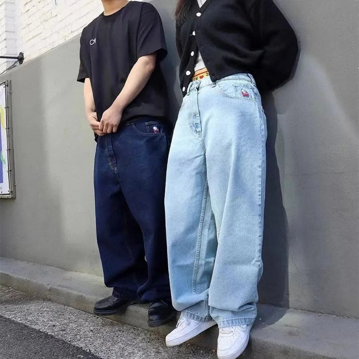 "Herr baggy jeans i svart denim, vida ben, avslappnad stil, framsida."