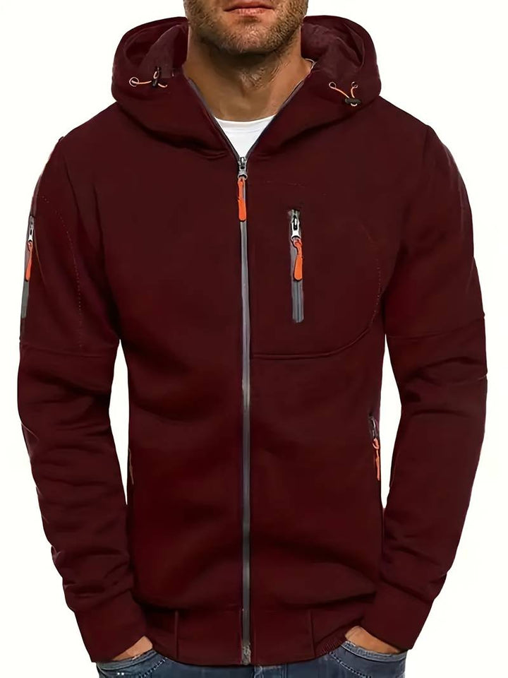 "Herr casual hoodie med bekväm passform, stilrena detaljer och huvudficka. Perfekt för träning och vardaglig stil."