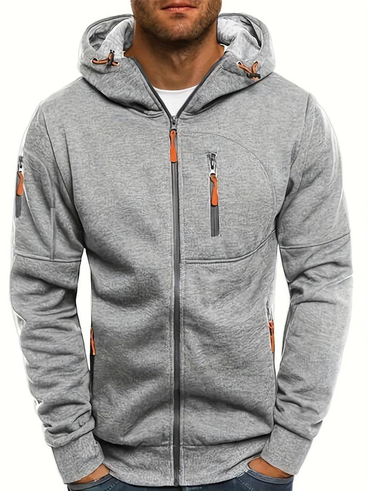 "Herr casual hoodie med bekväm passform, stilrena detaljer och huvudficka. Perfekt för träning och vardaglig stil."