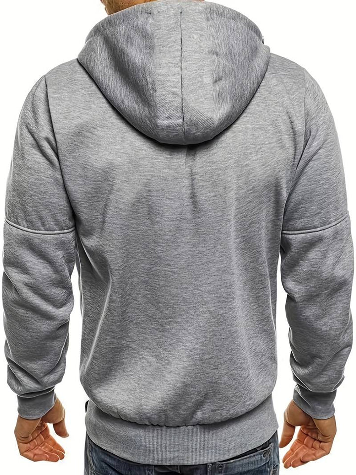 "Herr casual hoodie med bekväm passform, stilrena detaljer och huvudficka. Perfekt för träning och vardaglig stil."
