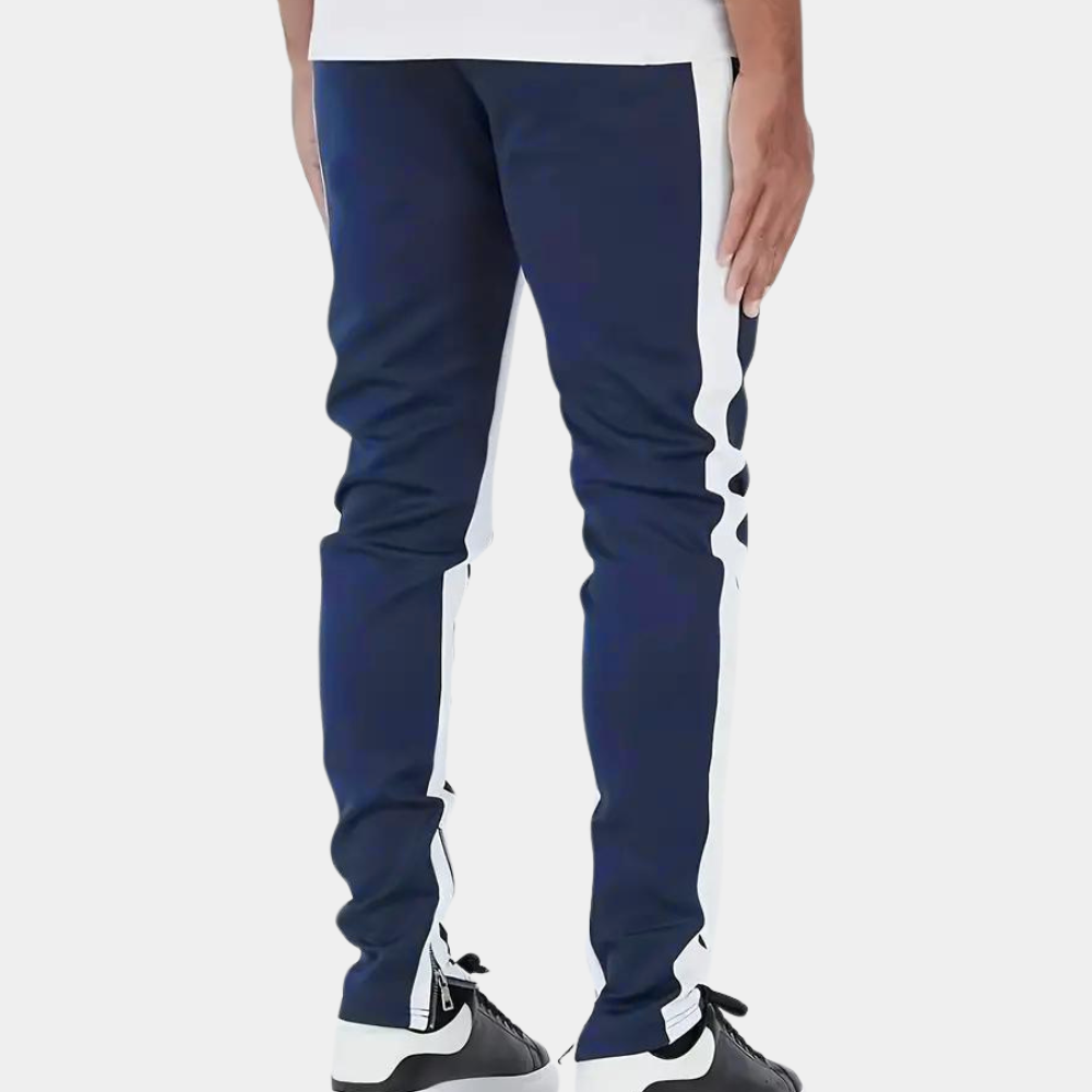 "Herr joggingbyxor i modernt snitt, elastisk midja, slimmad passform, sidofickor, lätt tyg, perfekt för gym och fritid."