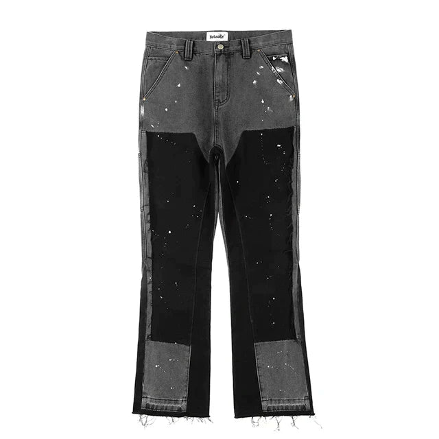 "Herr retro streetwear denim byxor med fläckig bläckfärg och baggy passform, konstnärligt mönster för unik stil"