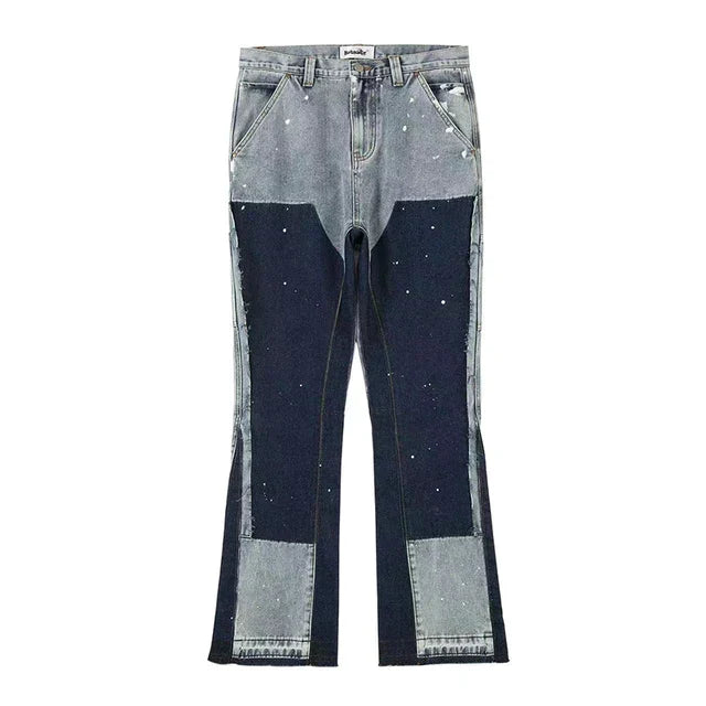 "Herr retro streetwear denim byxor med fläckig bläckfärg och baggy passform, konstnärligt mönster för unik stil"