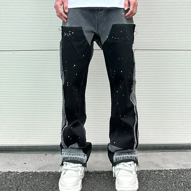 "Herr retro streetwear denim byxor med fläckig bläckfärg och baggy passform, konstnärligt mönster för unik stil"