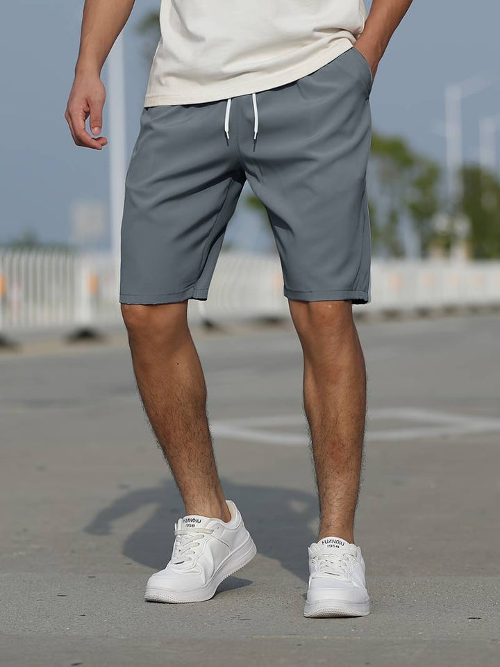 "Herr shorts i cordmaterial med justerbar snörning, avslappnad passform, beige färg för stil och komfort."