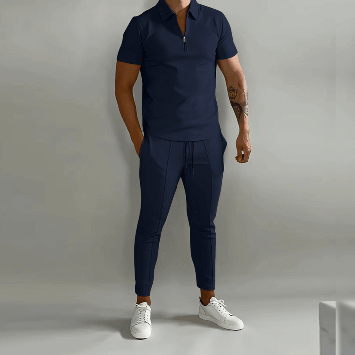 "Herr slim fit joggingdräkt med halv dragkedja, smidig passform, moderna detaljer, perfekt för sport och vardag."