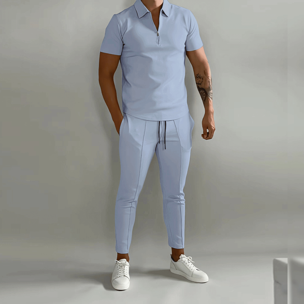 "Herr slim fit joggingdräkt med halv dragkedja, smidig passform, moderna detaljer, perfekt för sport och vardag."