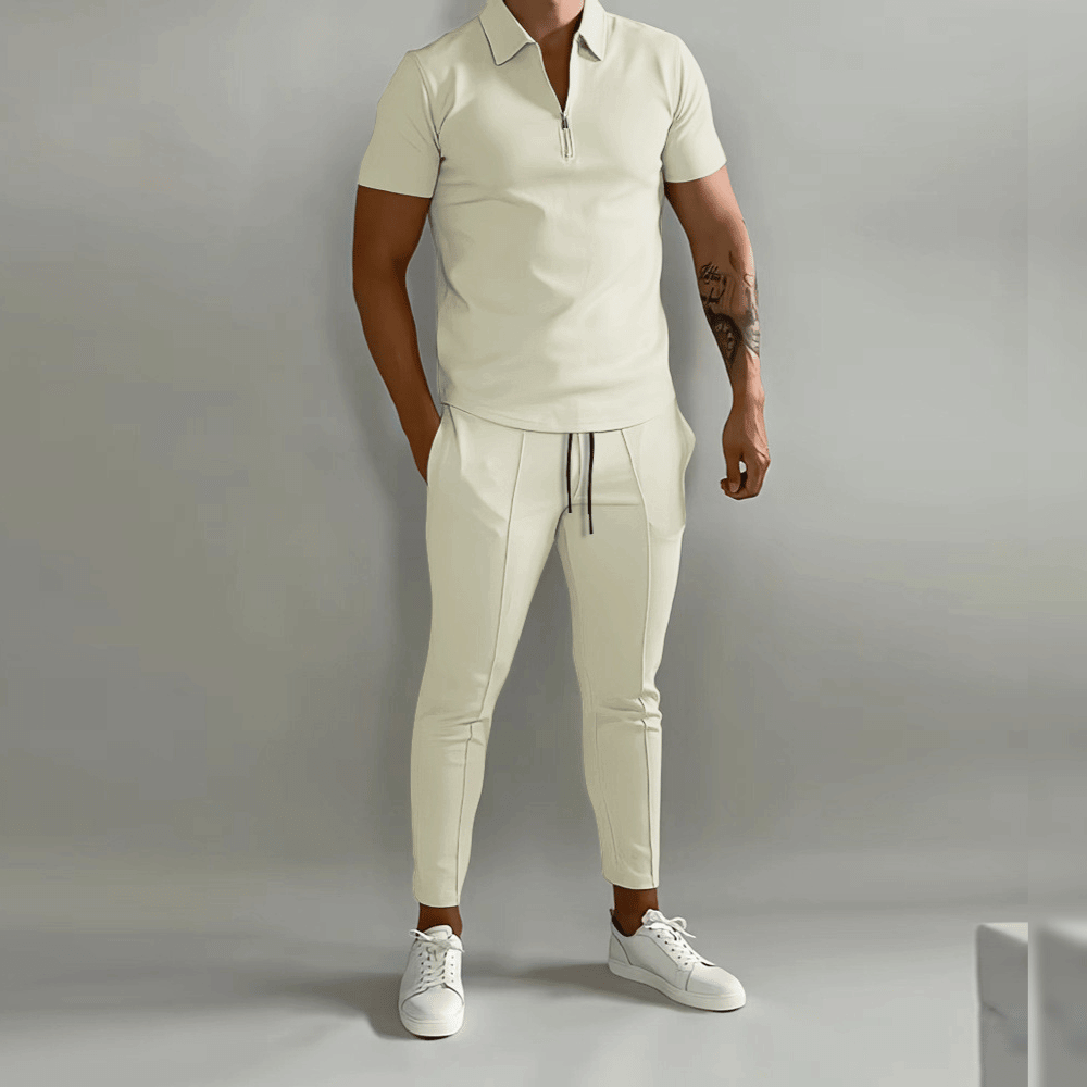 "Herr slim fit joggingdräkt med halv dragkedja, smidig passform, moderna detaljer, perfekt för sport och vardag."