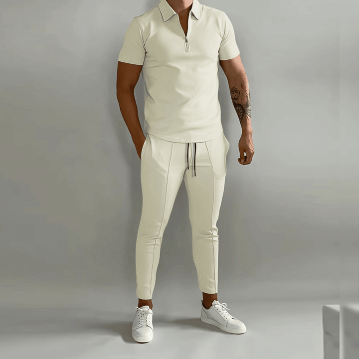 "Herr slim fit joggingdräkt med halv dragkedja, smidig passform, moderna detaljer, perfekt för sport och vardag."