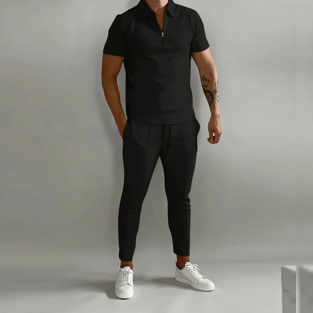 "Herr slim fit joggingdräkt med halv dragkedja, smidig passform, moderna detaljer, perfekt för sport och vardag."