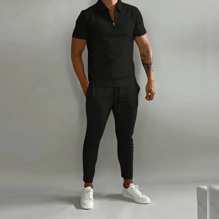 "Herr slim fit joggingdräkt med halv dragkedja, smidig passform, moderna detaljer, perfekt för sport och vardag."