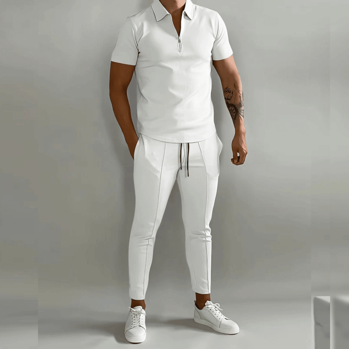 "Herr slim fit joggingdräkt med halv dragkedja, smidig passform, moderna detaljer, perfekt för sport och vardag."