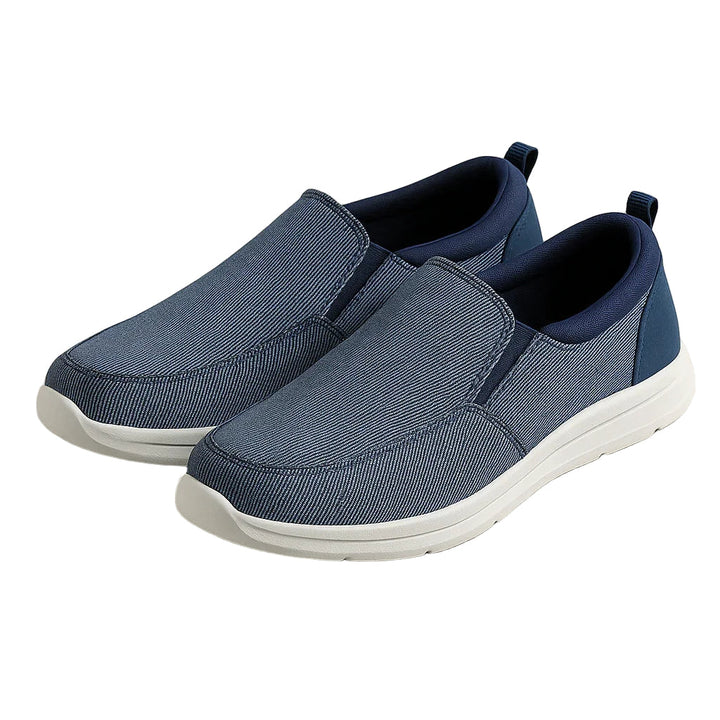 "Herr slip-on loafers i bekväm canvas med ren stil, perfekt för både avslappnad och modern klädsel."