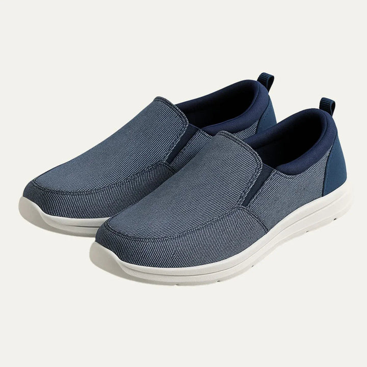 "Herr slip-on loafers i bekväm canvas med ren stil, perfekt för både avslappnad och modern klädsel."