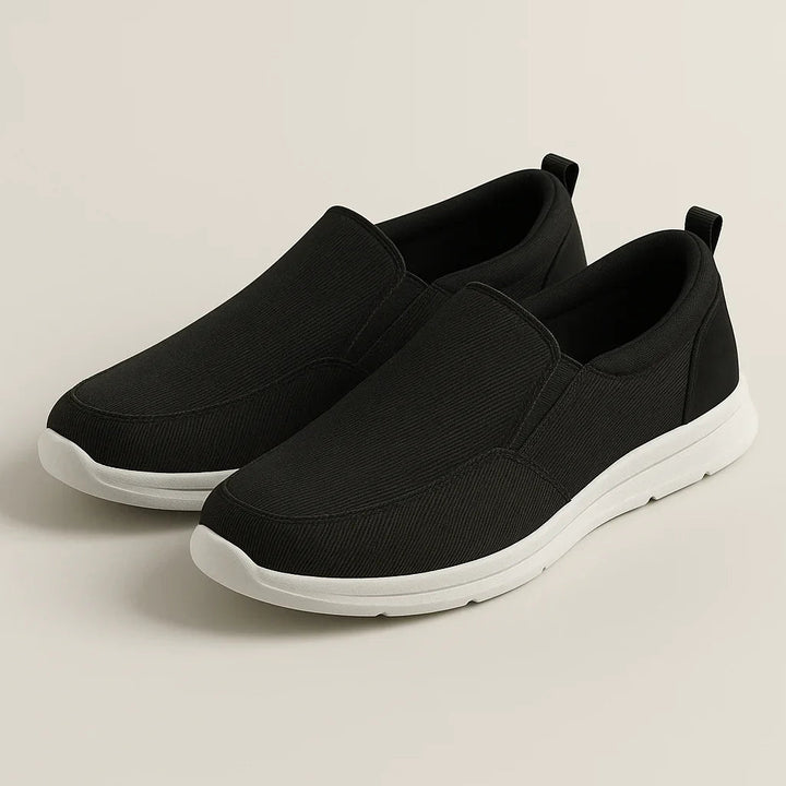"Herr slip-on loafers i bekväm canvas med ren stil, perfekt för både avslappnad och modern klädsel."