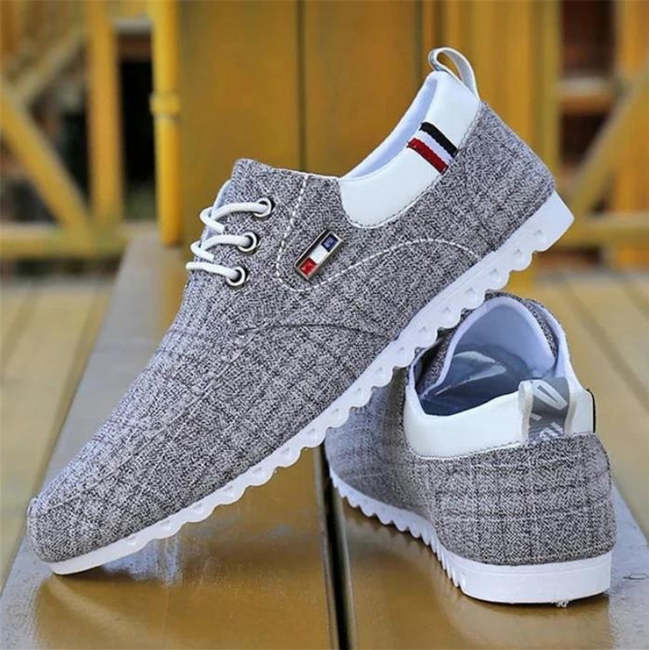 Herr sneakers i andningsbar canvas med halkskydd, casual stil, robust gummisula, idealisk för alla tillfällen.