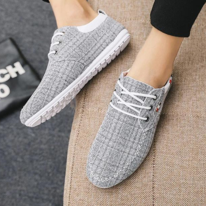 Herr sneakers i andningsbar canvas med halkskydd, casual stil, robust gummisula, idealisk för alla tillfällen.
