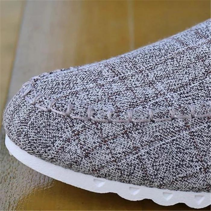 Herr sneakers i andningsbar canvas med halkskydd, casual stil, robust gummisula, idealisk för alla tillfällen.