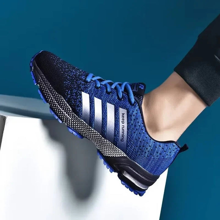 Herr sneakers låg topp i mesh, flerfärgad patchwork-design med andningsbar och halkfri sula för vardag och skateboarding.
