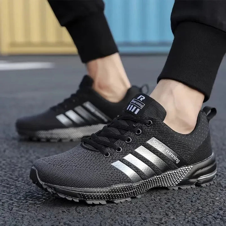 Herr sneakers låg topp i mesh, flerfärgad patchwork-design med andningsbar och halkfri sula för vardag och skateboarding.