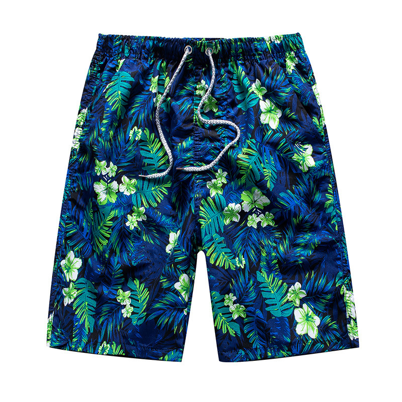 "Herr strandshorts med mönster, lätt bomull, snabbtorkande, elastisk midja och dragsko, perfekt för stranddagar."
