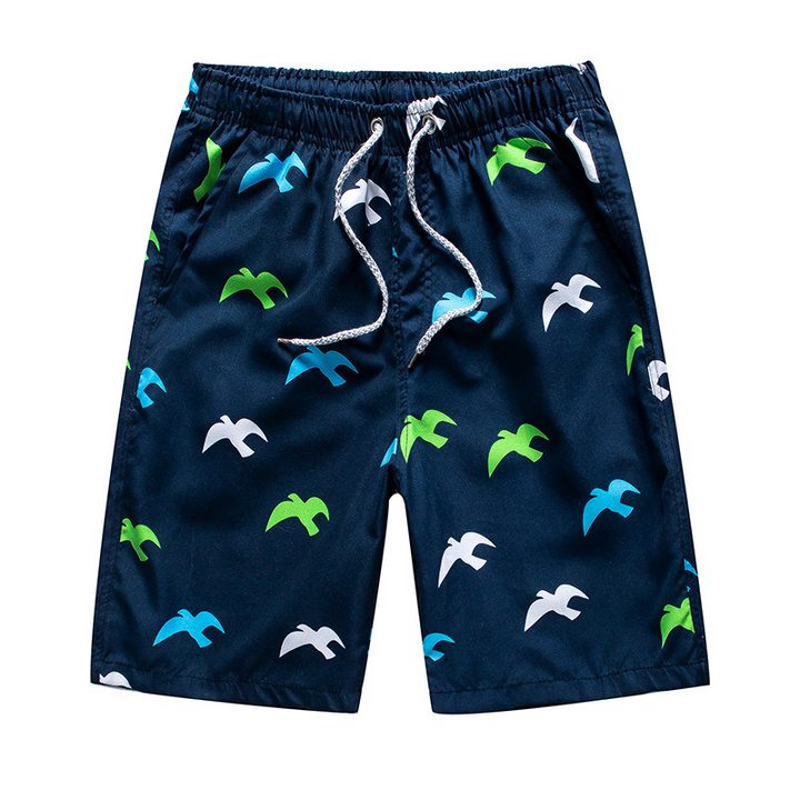 "Herr strandshorts med mönster, lätt bomull, snabbtorkande, elastisk midja och dragsko, perfekt för stranddagar."
