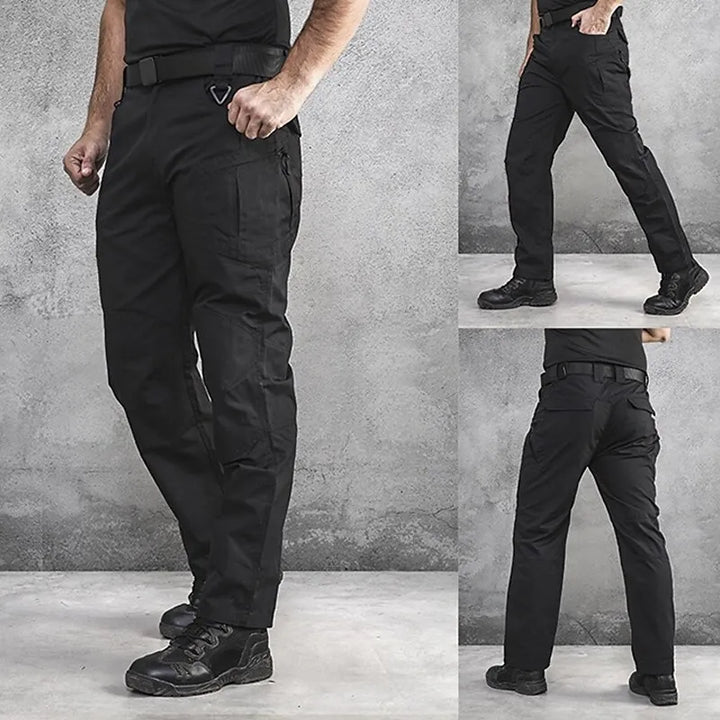 "Herr taktiska lastbyxor i polyester med flera fickor, idealiska för friluftsliv, grön färg och robust design."