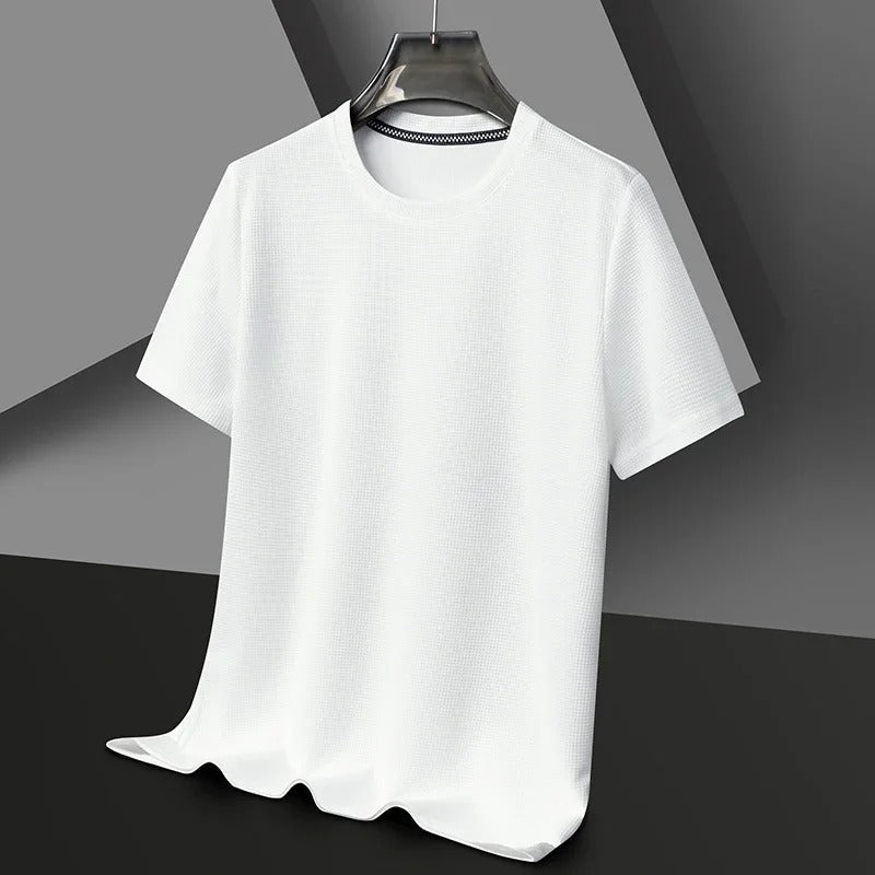 "Herr våfflad bomullst-shirt med rund hals, grön, unikt texturerat tyg, andningsbart och stilfullt, perfekt vardagsplagg."