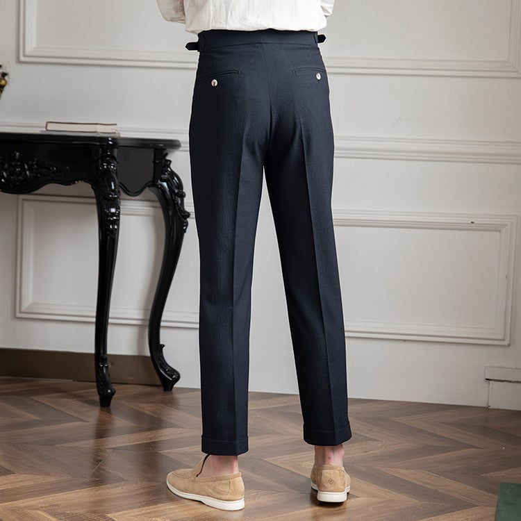 "Herr vintage byxor hög midja, raka ben, framsida i beige och blå nyans, stilren och tidlös design."