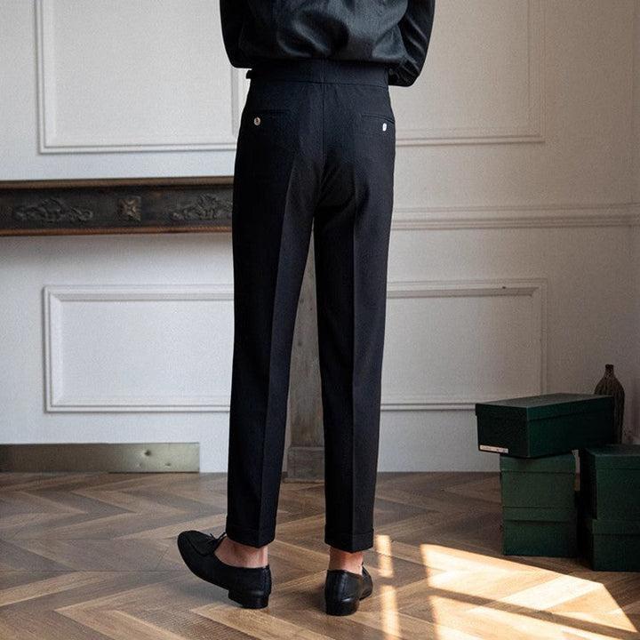 "Herr vintage byxor hög midja, raka ben, framsida i beige och blå nyans, stilren och tidlös design."
