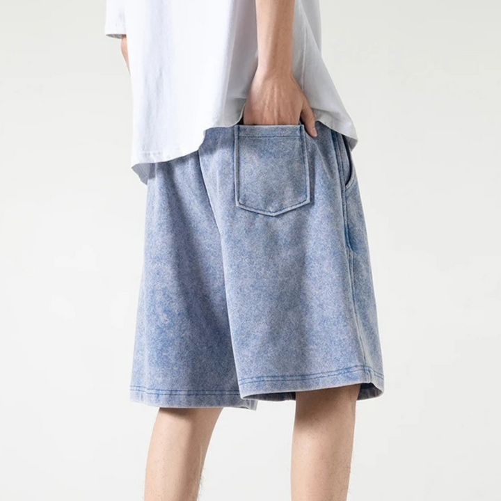 "Herrar dragsko cotton shorts i bomull med unik design, justerbar dragsko och fickor för stil och komfort."