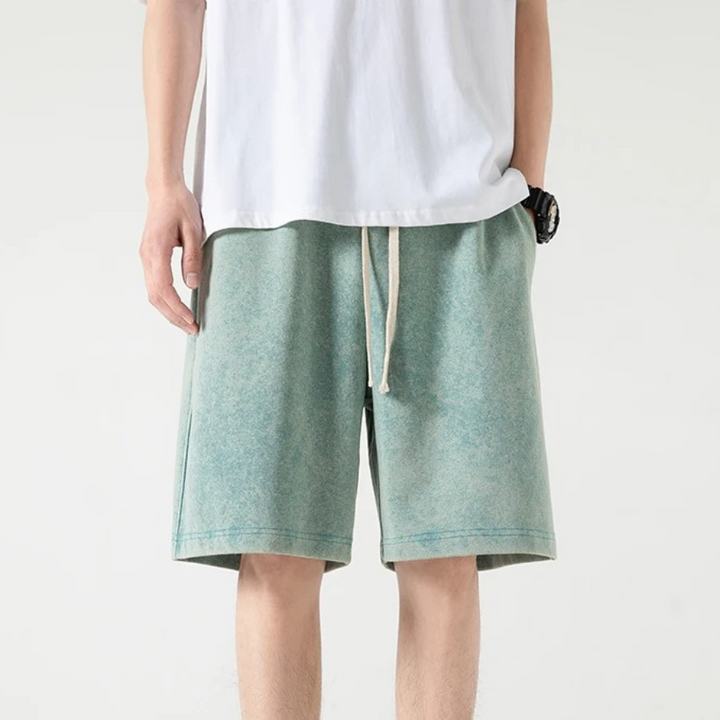 "Herrar dragsko cotton shorts i bomull med unik design, justerbar dragsko och fickor för stil och komfort."