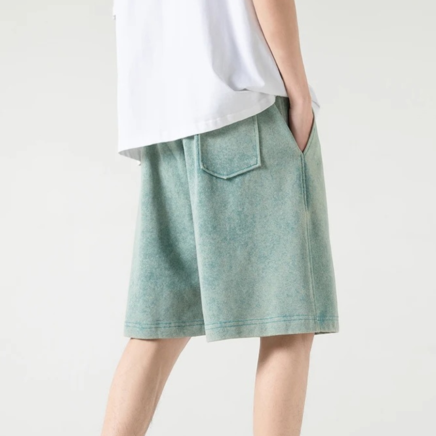 "Herrar dragsko cotton shorts i bomull med unik design, justerbar dragsko och fickor för stil och komfort."