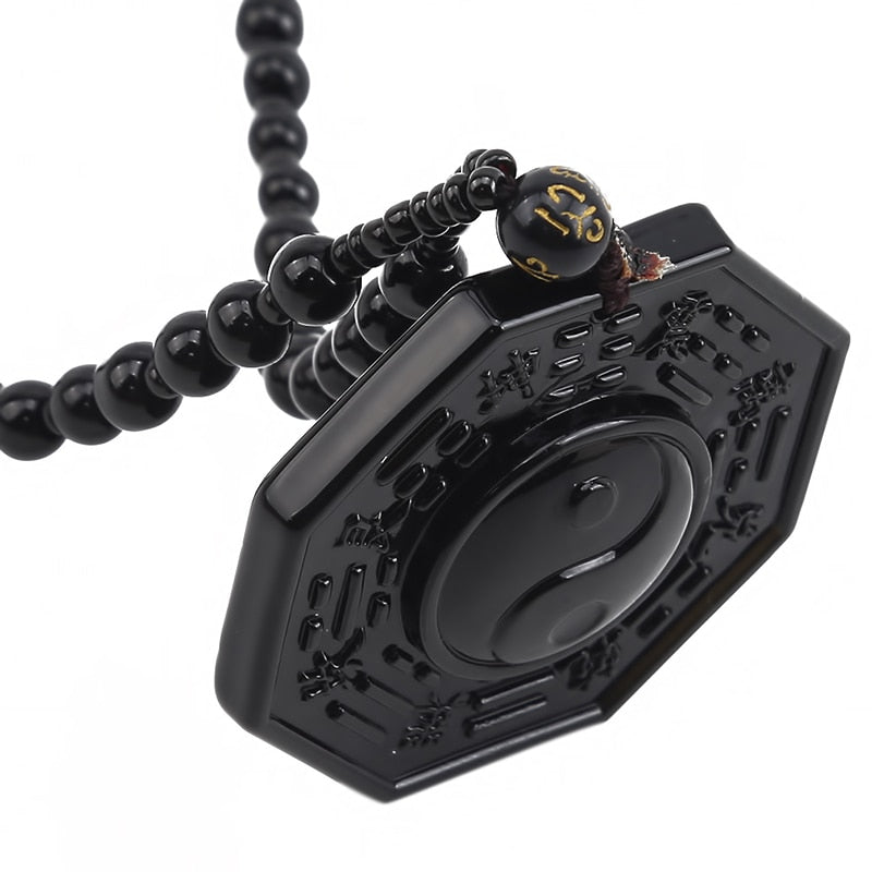 Herrens Yin Yang Halsband i svart obsidian med mantrapärla, elegant design som främjar balans och inre frid.