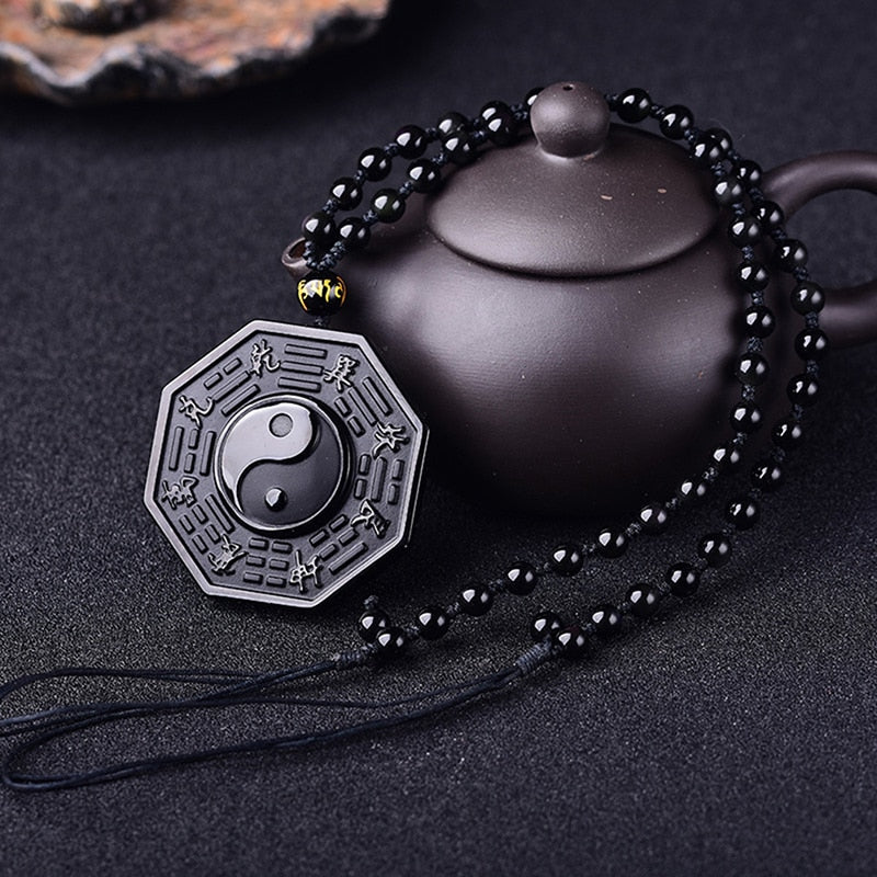 Herrens Yin Yang Halsband i svart obsidian med mantrapärla, elegant design som främjar balans och inre frid.