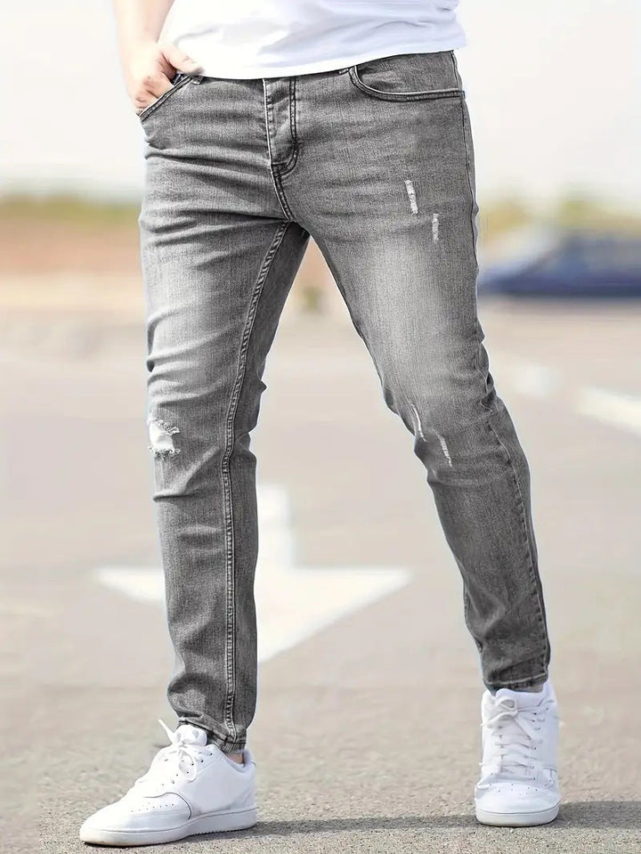"Herrens ripped stretch jeans med slitna detaljer, trendig stil, kombinerar komfort och modern design, perfekt för casual loo