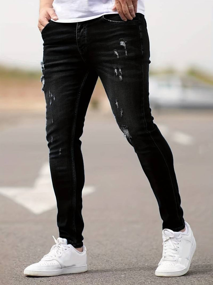 "Herrens ripped stretch jeans med slitna detaljer, trendig stil, kombinerar komfort och modern design, perfekt för casual loo