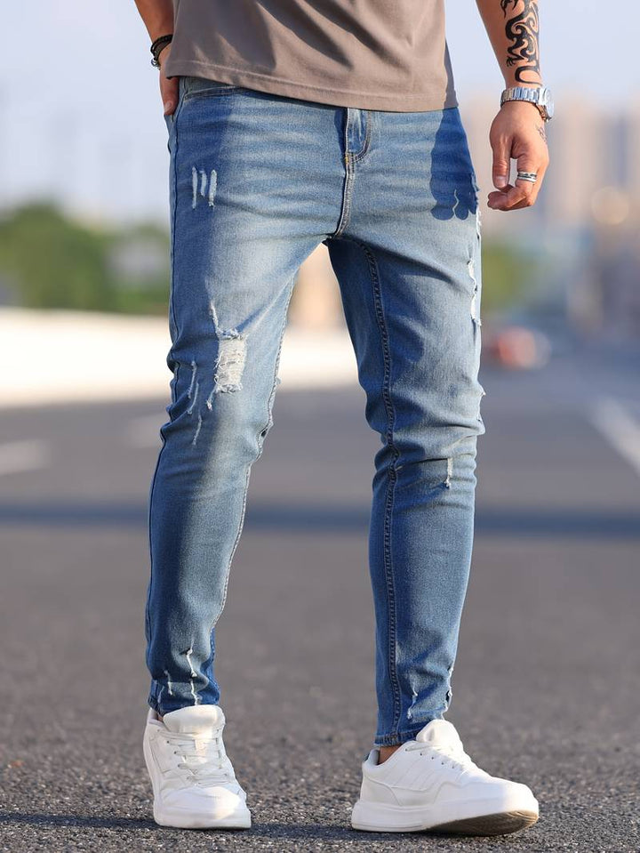 "Herrens ripped stretch jeans med slitna detaljer, trendig stil, kombinerar komfort och modern design, perfekt för casual loo