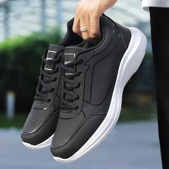 Herrens vinter andningsbara sneakers i syntetiskt material, eleganta med anti-glid sula, perfekta för kalla dagar.