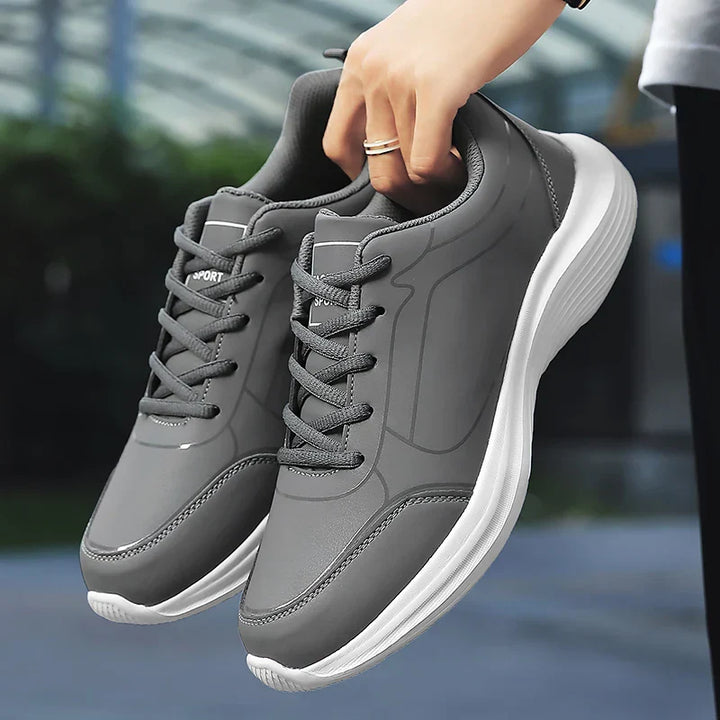 Herrens vinter andningsbara sneakers i syntetiskt material, eleganta med anti-glid sula, perfekta för kalla dagar.