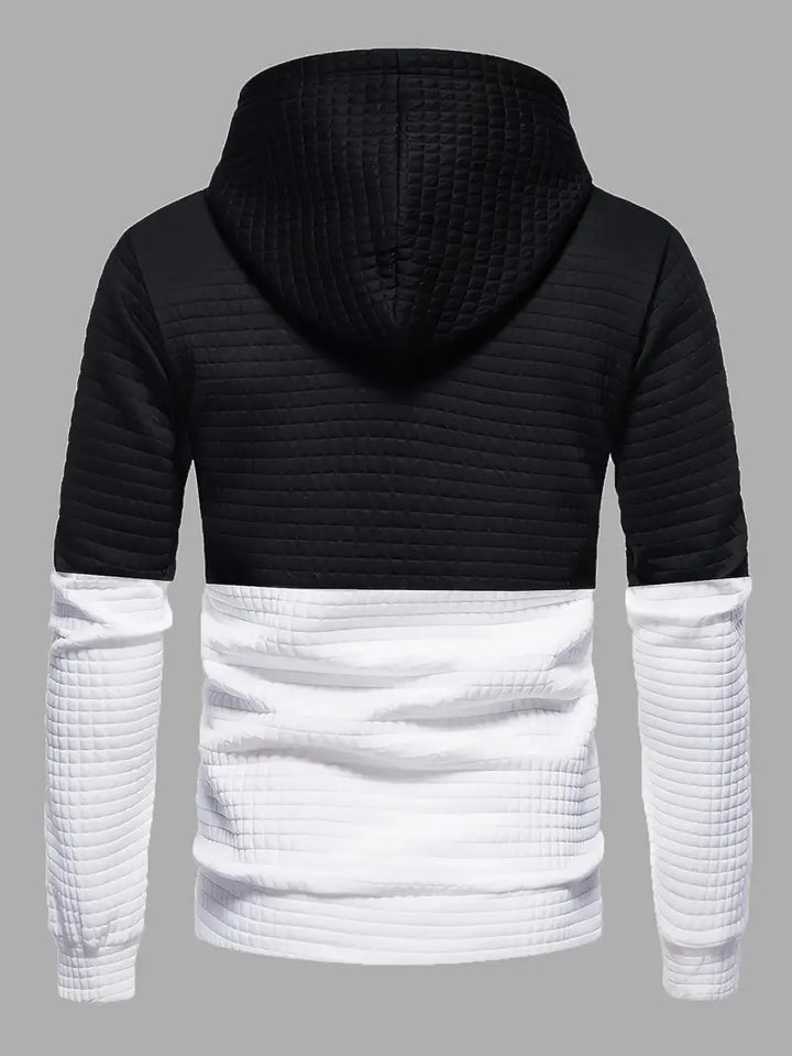 "Herrhoodie med våffelmönster i mjuk tygblandning, perfekt för både avslappnade och formella tillfällen."
