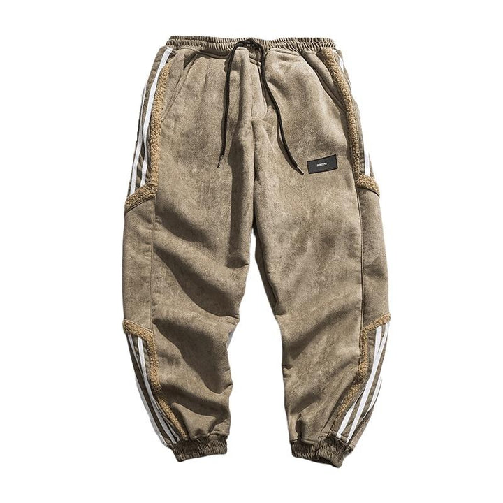 "Herrjoggers i bomull med sidosträckning, trendig stil och elastisk midja för sport och fritid."