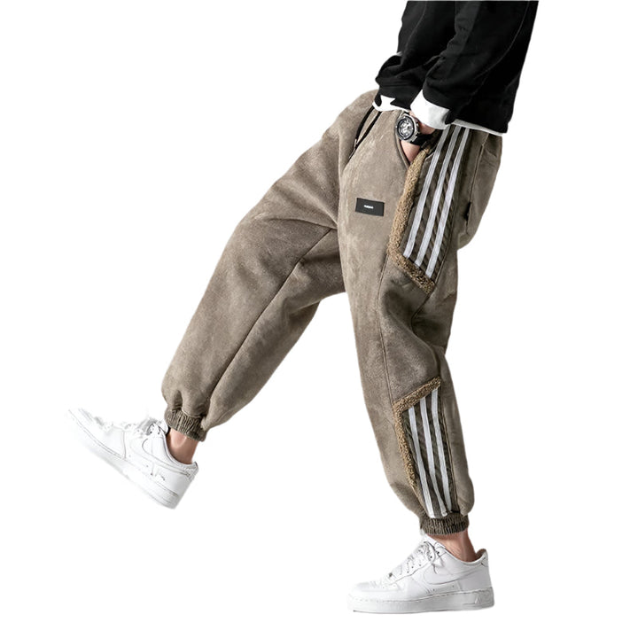 "Herrjoggers i bomull med sidosträckning, trendig stil och elastisk midja för sport och fritid."